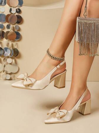 女士高跟鞋，鞋头饰有蝴蝶结，时尚百搭，适合通勤、商务和休闲场合，四季皆宜