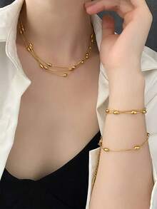 1 Set de Joyería de Collar y Pulsera de Acero Inoxidable Multicapa de Lujo, Estilo Minimalista Elegante, Versátil para Regalo o Uso Diario - Amarillo Oro - Ver 3