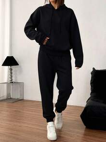 Conjunto  deportivo de pantalones rectos,  con sudadera de manga larga con capucha. - Negro - Ver 3