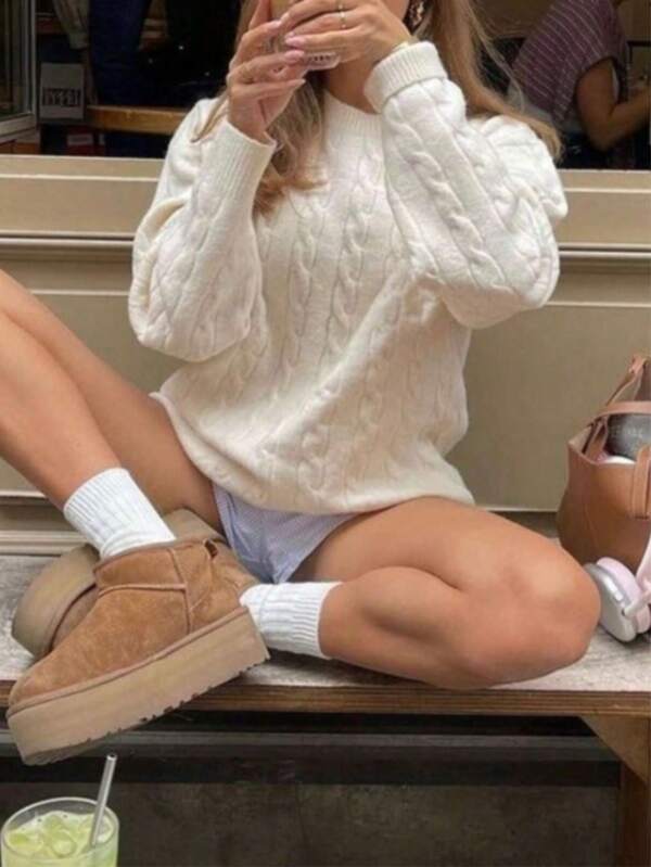 Suéter de punto beige de manga larga y longitud regular para mujer