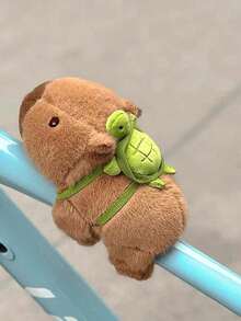 柔软毛绒水豚腕带玩偶 - 这款棕色毛绒水豚玩偶面带微笑，采用聚酯纤维制成。它可以互动拥抱和拍打。是生日、圣诞节、情人节礼物和派对礼品的完美之选。 - 彩色 - 查看 7