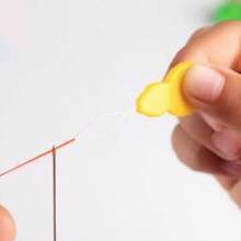 2 Pieces, 5 Pieces, 10 Pieces. Needle Threading Tool. Thread Threading Tool. Needle Threading Tool. Automatic Needle Recognition Device. Sewing Machine. Needle Threading Device - Random 5 - View 4