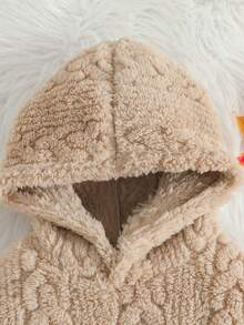 This Adorable Beige Hooded Plush Set Will Have Your Little One Snuggling In Comfort. The Soft, Quality Fabric And Cozy Design Of The Hooded Sweatshirt And Pants Set Feature A Charming Knit-Like Texture, Perfect For Keeping Them Warm And Stylish On Chilly Days. An Essential For Cold Weather, This Set Also Makes A Great Birthday Gift.