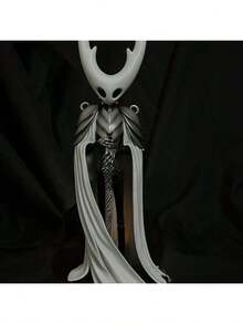 تمثال فارغ من سلسلة فارس الفارغ: تمثال ملك الفرسان، تصميم رداء أبيض وأسود، تفاصيل حية ومنحوتة السيف والعصا، مناسب للمكتب أو خزانة العرض، يعزز جو اللعبة والحس الفني. يتطلب التجميع.