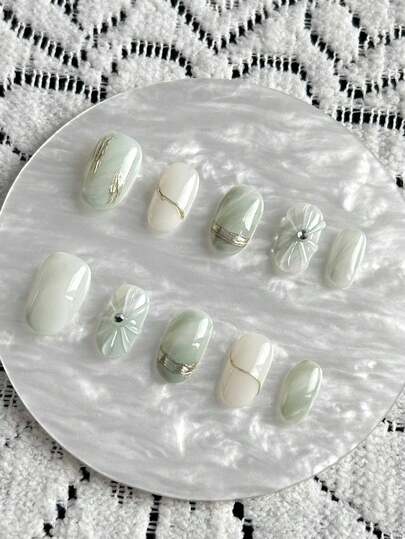 qihangxin 10片手工短指甲贴纸，浅绿色渐变色，金属线条装饰，3D水滴花朵，钻石点缀，优雅短椭圆形指甲贴纸，可重复使用，可移除，附带工具包，适合日常佩戴或作为节日礼物