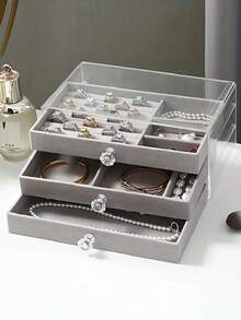 1个优雅三层首饰收纳盒，带抽屉 - 长方形布艺耳环架，防尘展示盒，完美的家居装饰品。男女皆宜。天鹅绒抽屉美观且品质上乘。精致的水晶拉手方便取用三个隔层中的首饰，整齐收纳耳环、项链和戒指。 - 彩色 - 查看 7