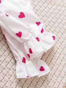 Rochie pentru fete cu imprimeu de inimă, guler Peter Pan, albă, imprimeu integral cu inimioare roz, guler Peter Pan și design cu fundă mare, stil dulce de prințesă. Potrivită pentru petreceri de ziua de naștere, dans, spectacole școlare. Primăvara, toamna, iarna.