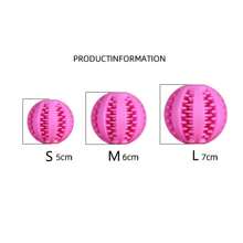 A Rubber Grinding Ball For Dogs, A Chew Toy That's Durable, Wear-Resistant, And Can Clean Dogs' Teeth. It's A Chew Toy For Dogs That Can Hold Snacks. Pink And Colored Toys Provide Dogs With Different Joyful Experiences.