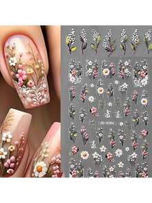 1/2 件，这些浮雕春季野花指甲贴展现了一系列精致细致的花卉图案。精致的花瓣、茎叶和野花都经过精心制作，呈现出栩栩如生、迷人的外观。柔和的粉色、白色和黄色色调的组合，为您的指甲带来春天的清新活力。 - 彩色 - 查看 12