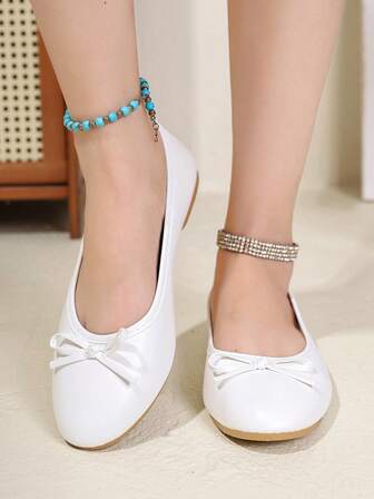 OFFWIND Eleganta vita ballerinaskor för kvinnor, ny vår-/sommarmodell, mångsidiga låga, bekväma, mjuka och lätta skor med rosettdekor, enkla att ta på, lämpliga för arbete