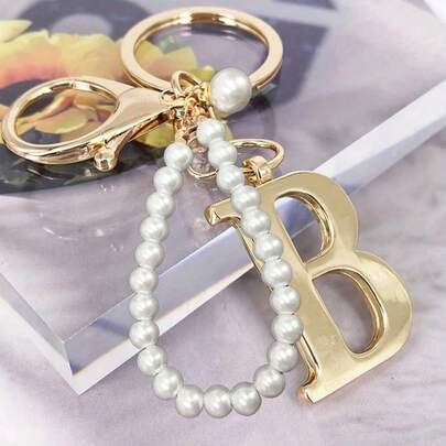 Advanced Elegant Golden Pearl Letter Keychain, Letters A-Z Three-Dimensional Pendant, Elegant Pearl Chain Flash Diamond (Removable According To Personal Preference) Fashion Alloy Keychain Ring, Earphone Pendant, Backpack Charm Car Keychain