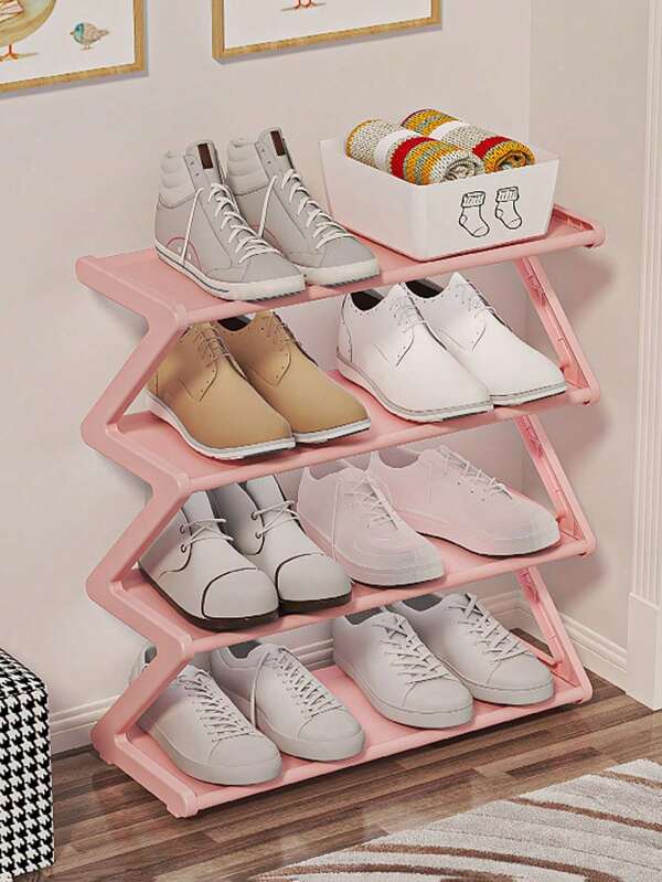 1 peça. A sapateira grande em formato de Z, com quatro camadas, nas cores rosa, branco e preto, pode ser facilmente montada sem ferramentas. É um organizador de armazenamento empilhável, adequado para casas, dormitórios e salas de estar. Possui um design compacto no piso e é um organizador de sapatos.