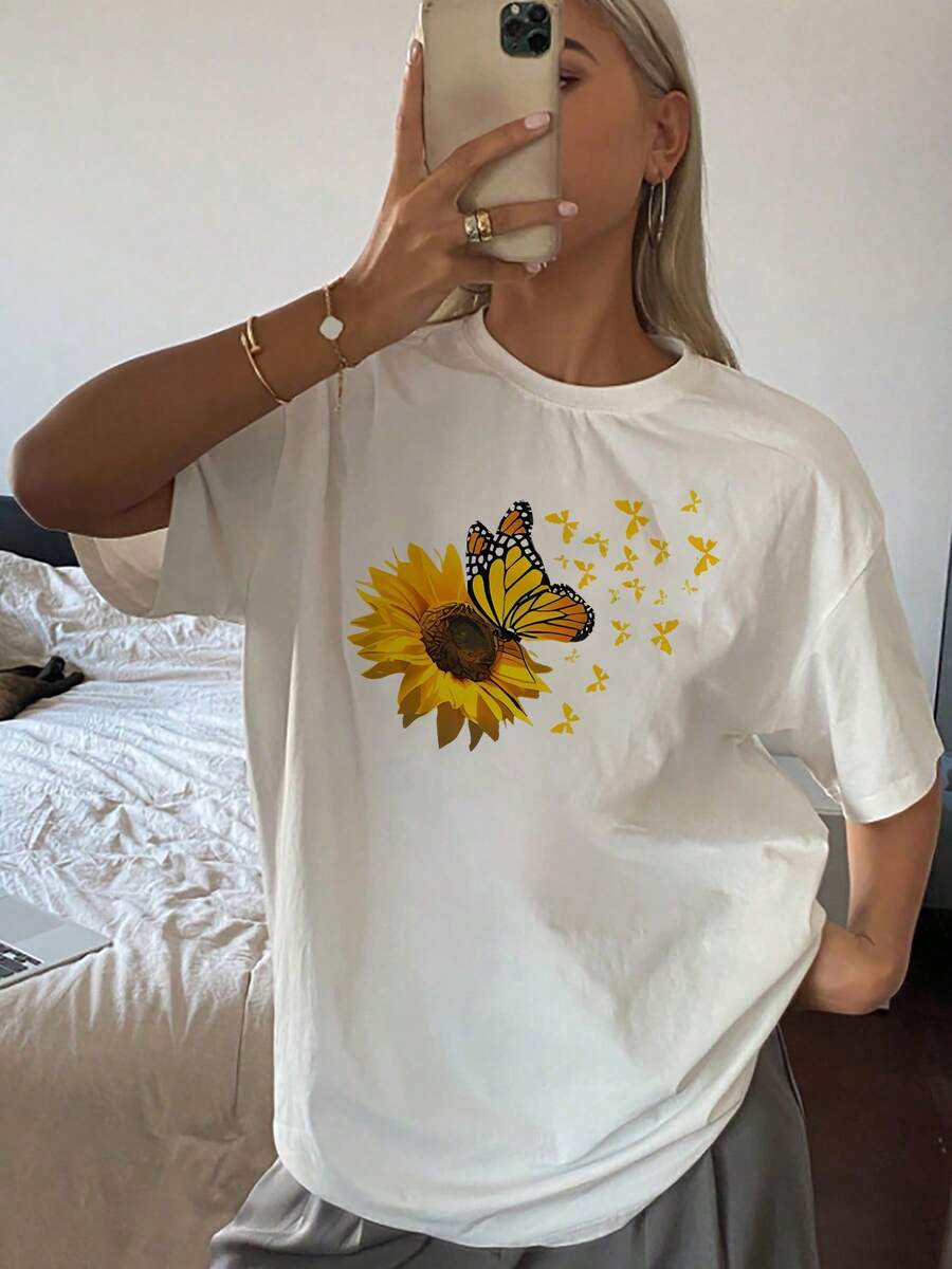 Elegante camiseta con estampado de girasoles y mariposas para mujer, mezcla de algodón suave, gráfico floral vibrante, estilo informal de verano, diseño inspirado en la naturaleza, camiseta de ajuste cómodo. - Blanco - Ver 1