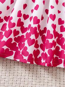 Rochie pentru fete cu imprimeu de inimă, guler Peter Pan, albă, imprimeu integral cu inimioare roz, guler Peter Pan și design cu fundă mare, stil dulce de prințesă. Potrivită pentru petreceri de ziua de naștere, dans, spectacole școlare. Primăvara, toamna, iarna.