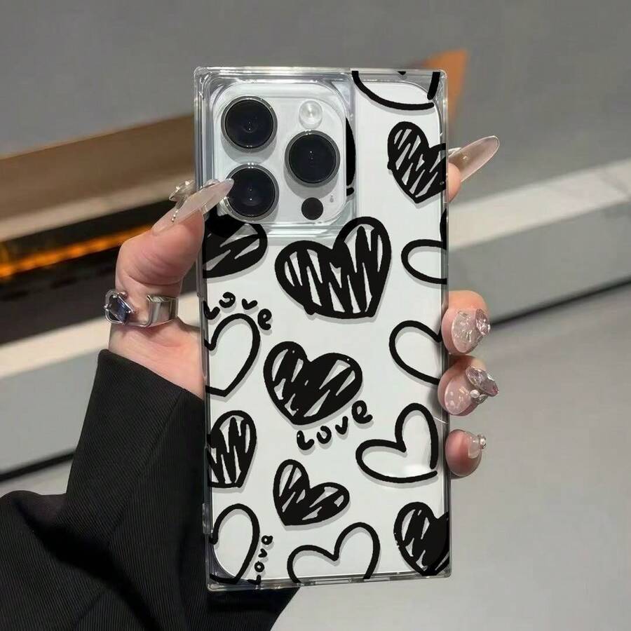 Funda para móvil con diseño de grafiti: corazón y cubo negros. Compatible con phone 16 Pro, 15, 14, 13 y 12. Diseño texturizado, estilo vintage, con cuentas. Funda elegante y artística. Protector premium y duradero. Ideal para entusiastas de la moda y usuarios. - transparente - Ver 1
