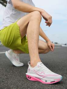 أحذية رياضية للرجال مزودة بلوح كربوني للاستخدام الخارجي، أحذية جري للسباقات والتدريب والنصف ماراثون وجري السرعة؛ أحذية رياضية للنساء، أحذية مسابقات ألعاب القوى والجري على الطرق، أحذية تنفس شبكية مقاومة للتآكل وامتصاص الصدمات ومانعة للانزلاق