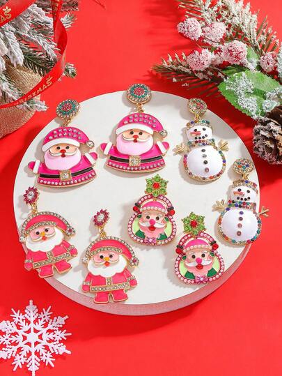 1 par de aretes con forma de Papá Noel y muñeco de nieve decorados con cristales de rinoceronte y esmalte rosa, un conjunto surtido de aretes con temática navideña, adecuados para el atuendo de fiesta navideña de las mujeres