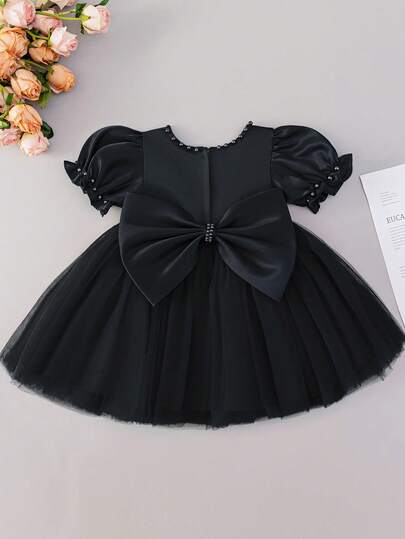 女婴黑色蝴蝶结装饰迷你连衣裙，生日派对和 1 岁生日薄纱裙