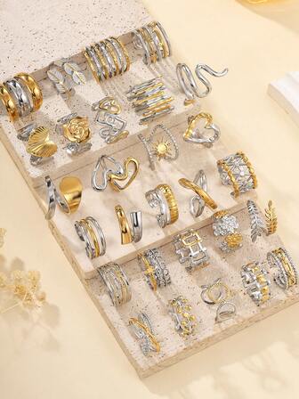 24件不锈钢时尚复古金色油压戒指混合款式，戒指款式随机，手指尺寸均为均码，适合女性日常装扮或送礼