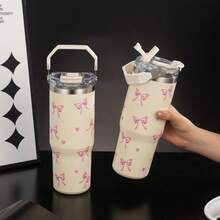 1个900毫升/33.44盎司心形蝴蝶结真空保温水瓶，大容量，带提手和吸管，双饮盖，适合旅行、户外、健身、学习、节日礼物 - 大米色蝴蝶結 - 查看 12