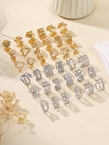 24pcs Stainless Steel Fashion Retro Golden Oil Pressure Ring Mixed Styles, Ring Styles Are Random, Finger Size Is One Size, Suitable For Women's Daily Dress Or Gift