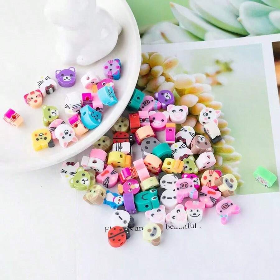 50 piezas/100 piezas Cuentas de arcilla polimérica con patrones de animales mixtos cortadas para hacer joyas DIY, accesorios para pulseras y collares