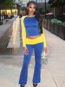 Dwuczęściowy komplet damski z kontrastowym rękawem typu raglan i szerokimi spodniami, wiosna/lato