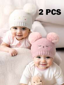2 pezzi Cappellino neonato/bambino con doppia pallina, occhi chiusi e viso sorridente ricamato, berretto in maglia per neonati, bambini piccoli, inverno caldo cappello in maglia per bimbi e bimbe - Multicolore - Visualizzare 1