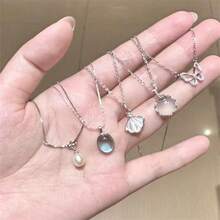 5-Piece Moonlight White Necklace Set: Alloy And Synthetic Materials, Shell-Shaped Glitter Butterfly Pendant, Suitable For Daily Wear And Gift Giving, Versatile For Various Occasions