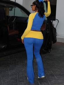 Dwuczęściowy komplet damski z kontrastowym rękawem typu raglan i szerokimi spodniami, wiosna/lato