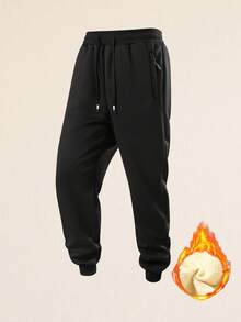 男士黑色抽绳运动裤，弹性腰带，休闲运动风，适合日常穿着和锻炼。