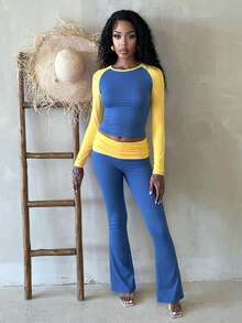 Dwuczęściowy komplet damski z kontrastowym rękawem typu raglan i szerokimi spodniami, wiosna/lato