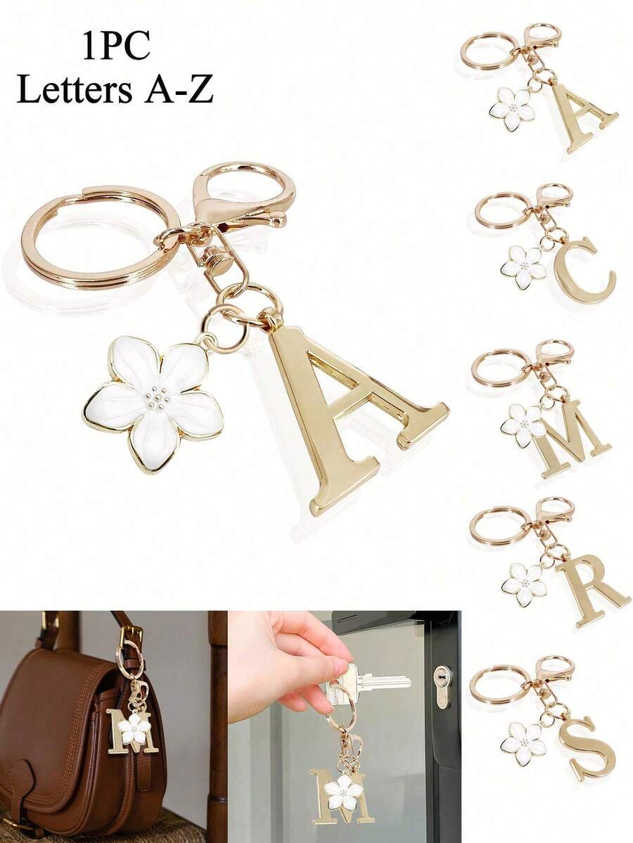 1个高级优雅金色字母钥匙扣，A-Z字母3D吊坠，配樱花挂饰，时尚合金钥匙圈，可作背包挂饰或汽车钥匙链，是女士的完美配饰，情侣礼物，经典简约钥匙扣，装饰品，包包挂饰，非常适合送给朋友、家人、情侣、女友，也是一份重要的礼物和节日纪念品。 - 彩色 - 查看 1