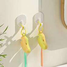 1/2 piezas - Caja para cepillo de dientes con forma de plátano - Funda reutilizable para cepillo de dientes con clip - Caja de almacenamiento de cepillo de dientes de plástico duradero - Funda protectora portátil y linda para cepillo de dientes, adecuada para viajes de negocios y uso doméstico - Adecuada para todos los cabezales de cepillo de dientes estándar - Funda protectora para cepillo de dientes en pareja (el fondo amarillo es verde, el fondo verde es amarillo)