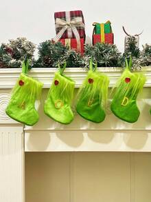 Opakowanie pojedyncze, skarpetki świąteczne, ozdoby świąteczne, zielony plusz, haftowane skarpetki z literami, ozdobne skarpetki świąteczne w torebce prezentowej