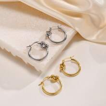 1 Paar Edelstahl verdrehte Kreis-Creolen, symbolisieren Liebe und Hingabe, modernes minimalistisches Design, stehen für erfüllende Beziehungen und Karriere, vielseitige hochwertige verknotete Ohrringe für Frauen, geeignet für den täglichen Gebrauch oder als Geschenk