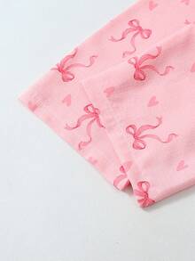 Conjunto de pijama de manga larga con estampado de lazo y corazón para mujer, ropa de otoño e invierno