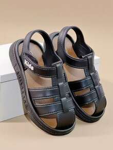 HAHABOBO 黑色新款时尚儿童凉鞋 - 纯色条纹图案,时尚简约,日常百搭,优雅大方,适合男孩、女孩和幼儿穿着。舒适柔软,平底轻便,魔术贴设计,适合户外散步、通勤、上学、海滩、花园等各种场合,也可作拖鞋穿着;完美适用于夏季、秋季及所有季节。 - 黑色 - 查看 4