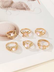 Juego de 10 anillos asimétricos de aleación para damas, con estilos seleccionados al azar, adecuado para que las damas los usen en festivales