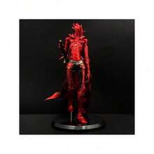 Vibrant Crimson Samurai Statue With Sword-Wielding Dynamic Elegance, Flowing Cloak, And Hand-Painted Details – Embodying Strength And Beauty As Artistic Decoration.