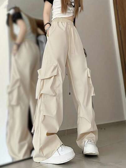 女士休闲宽松纯色口袋抽绳裤，适合日常穿着