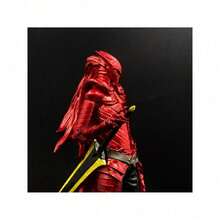 Vibrant Crimson Samurai Statue With Sword-Wielding Dynamic Elegance, Flowing Cloak, And Hand-Painted Details – Embodying Strength And Beauty As Artistic Decoration.