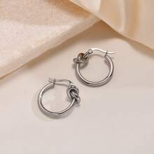 1 Paar Edelstahl verdrehte Kreis-Creolen, symbolisieren Liebe und Hingabe, modernes minimalistisches Design, stehen für erfüllende Beziehungen und Karriere, vielseitige hochwertige verknotete Ohrringe für Frauen, geeignet für den täglichen Gebrauch oder als Geschenk