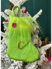 Opakowanie pojedyncze, skarpetki świąteczne, ozdoby świąteczne, zielony plusz, haftowane skarpetki z literami, ozdobne skarpetki świąteczne w torebce prezentowej