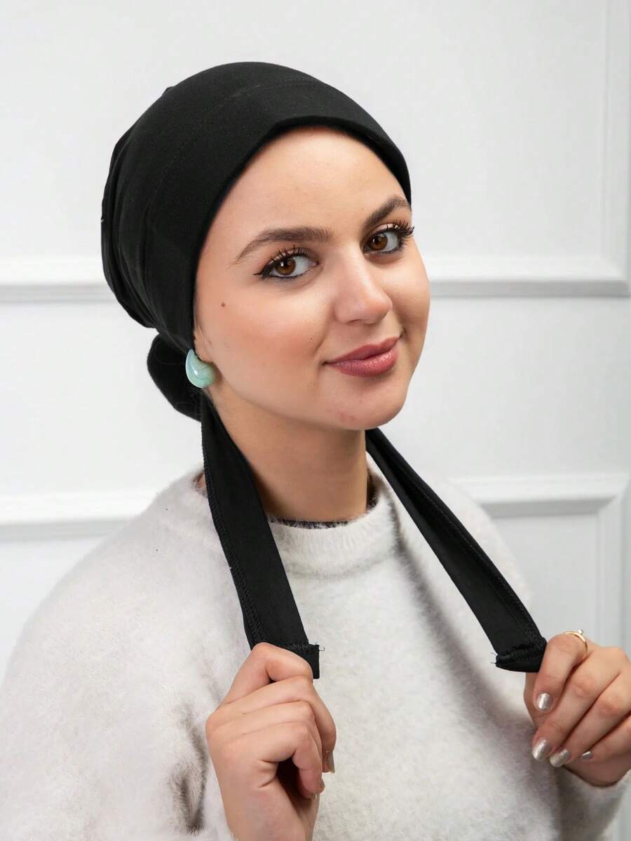 1 pieza Gorra interior con banda elástica incorporada y correas de amarre, suave y sedosa, transpirable, absorbente del sudor, elástica y resistente a las pelusas, adecuada para uso diario como capa base para vestir - Negro - Ver 1