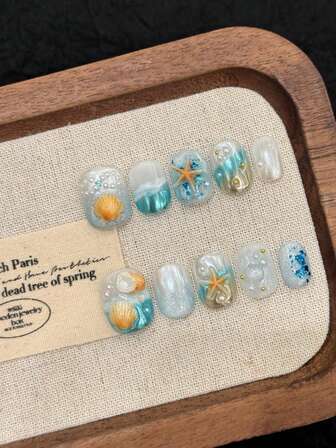 10 件短椭圆形手工按压指甲，适合派对和日常佩戴，蓝色指甲，美丽的海星，椭圆形指甲，樱桃，闪亮耀眼，易于佩戴 10 件 Y2K 手工按压指甲，夏季指甲，夏季风格，适合女孩和女士节日派对和日常佩戴指甲用品指甲