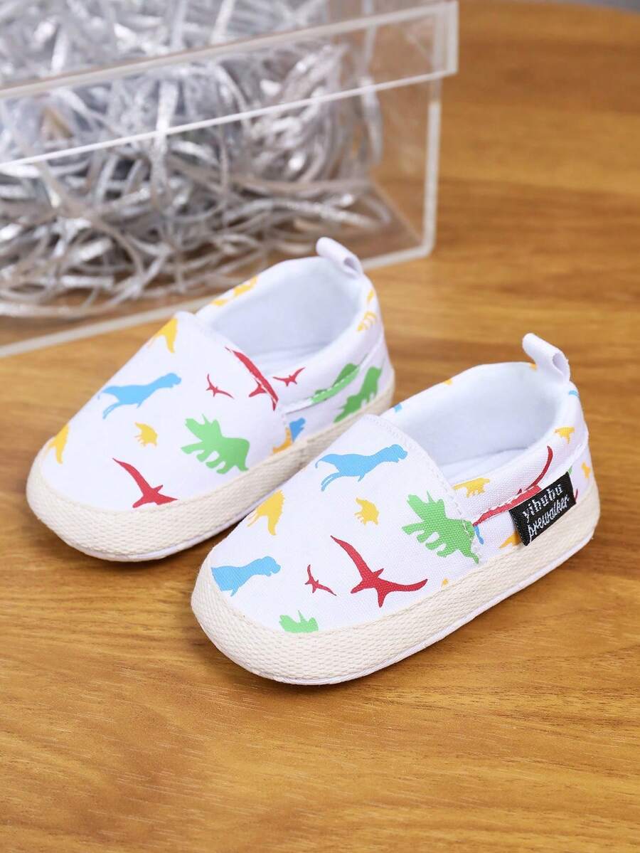yibubu أحذية بيضاء للأطفال الرضع بطبعات حيوانية، أحذية أنيقة للبنات الرضع بتصميم تنين، قابلة للتنفس ومريحة، أحذية مسطحة للرضع ذات نعل ناعم، أحذية مشي أول للمواليد، هدية عطلة