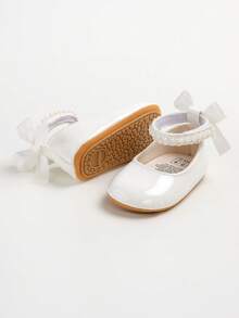 Nowe, płaskie buty Mary Jane dla dziewczynek, z kokardką, antypoślizgowa, miękka podeszwa z PU, buty do chodzenia dla małych dzieci, zdobione perłową satynową wstążką - Biały - Zobacz 8