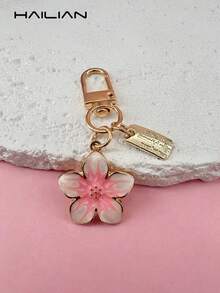 HAILIAN 1 Stück Schlüsselanhänger aus Metalllegierung in Kirschblüten-Form, leicht und elegant, mit rechteckigem Anhänger, geeignet als Tasche, Auto-Schlüsselanhänger, Geschenk für Paare, Geburtstag, Feiertage, Y2K