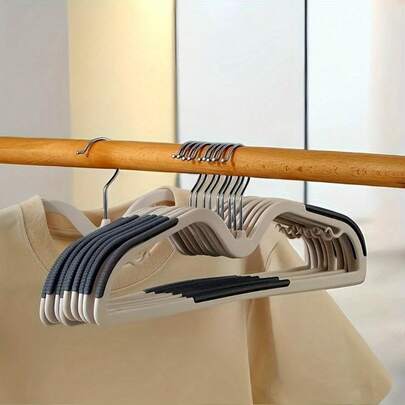 20 piezas Perchas para ropa resistentes y antideslizantes - Perchas estrechas para ahorrar espacio para almacenamiento de bebés, ganchos para camisas, vestidos, pantalones - Ideal para el hogar, lavandería, organización de armarios - Construcción de plástico duradero, percha para camisas y vestidos, percha de perfil delgado, percha con acabado suave